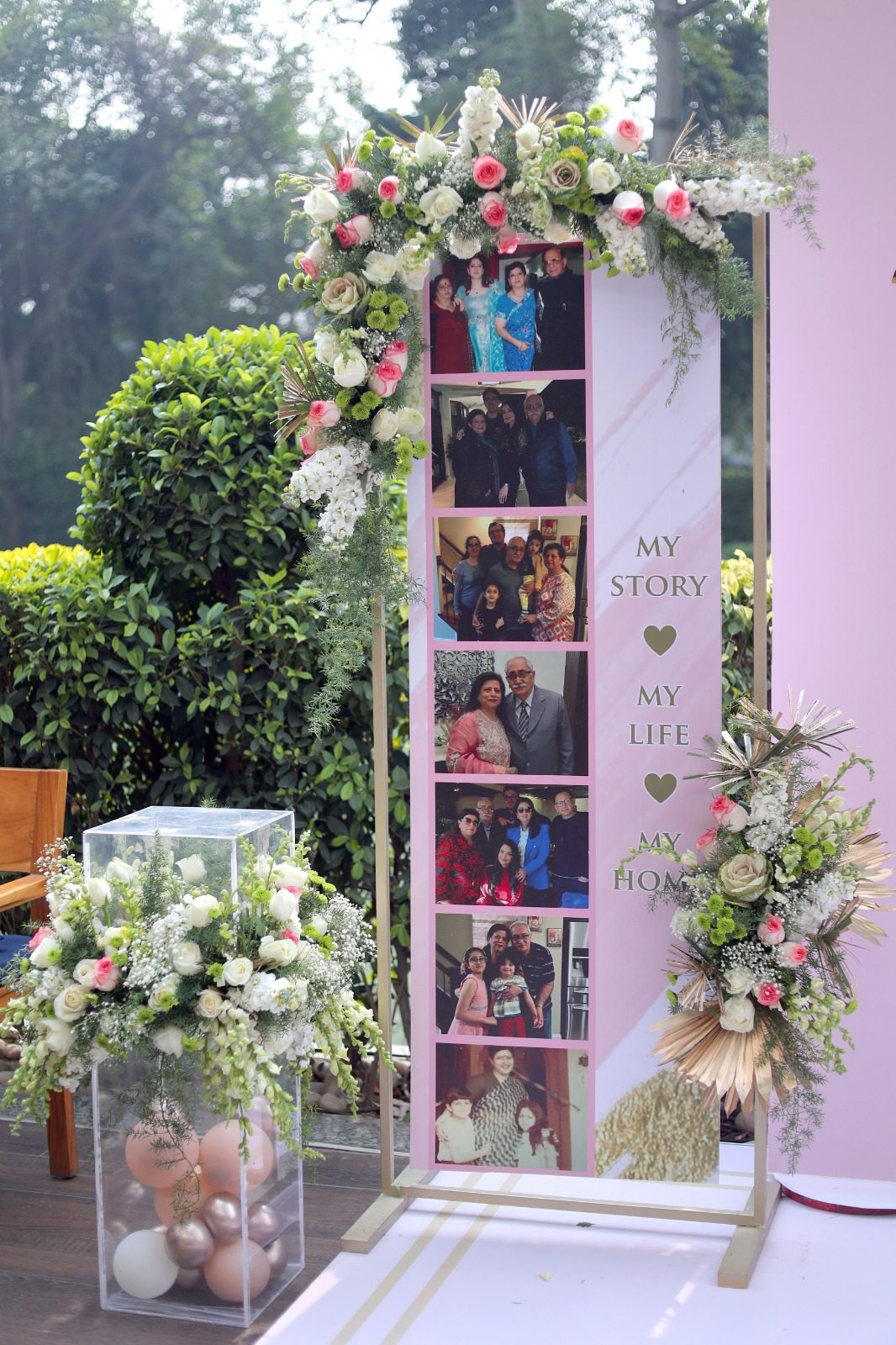 Floral arch with photo booth strip