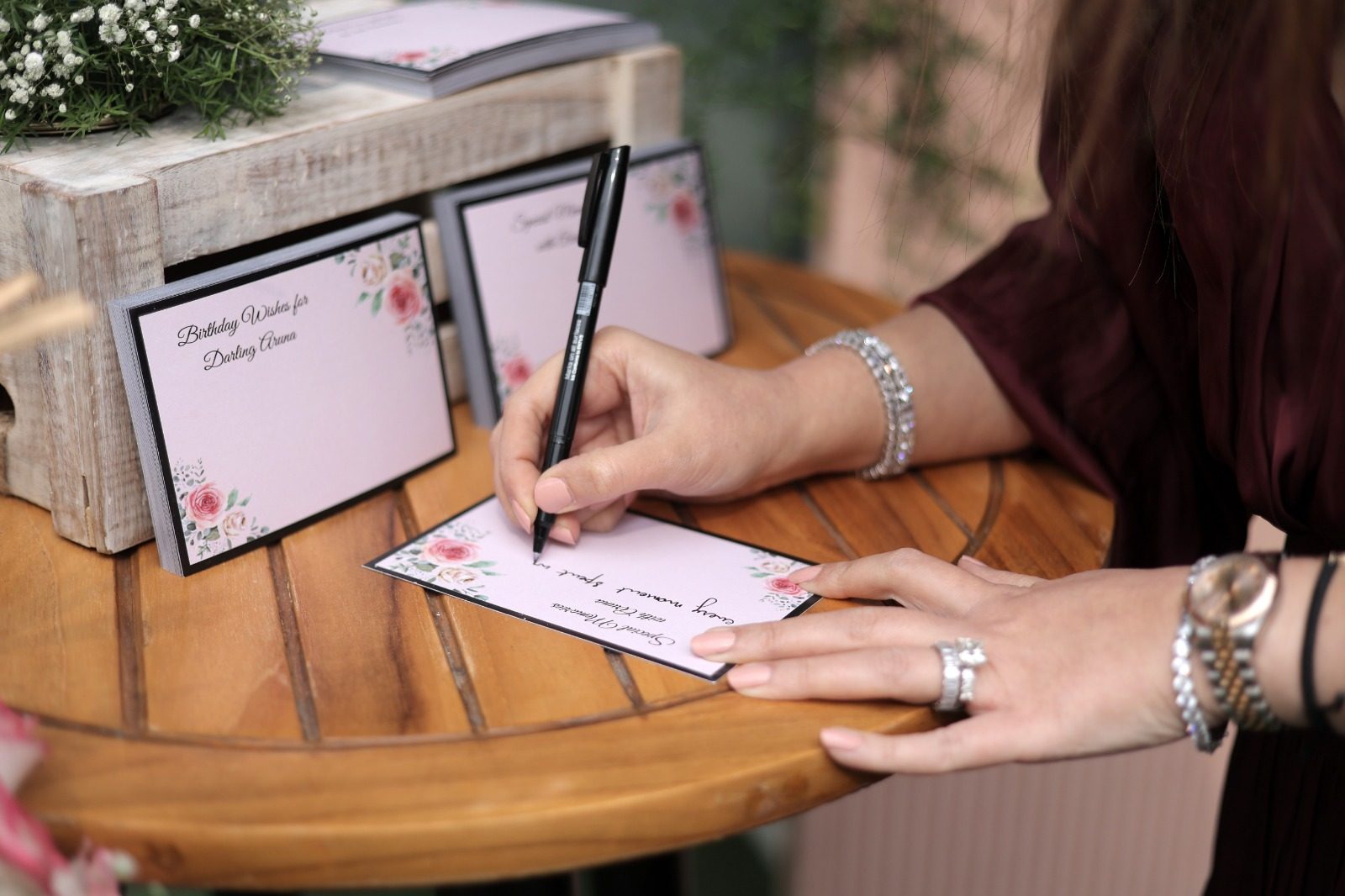 Guests writing birthday wishes