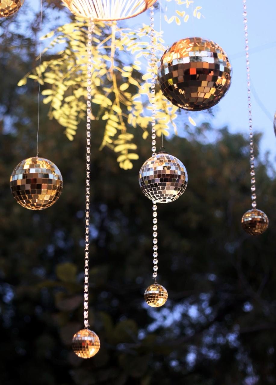 Hanging disco balls at night