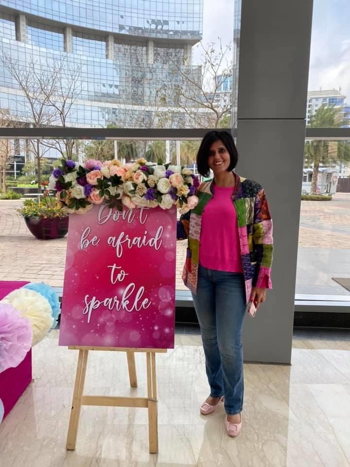 "Don't be afraid to sparkle" floral signage