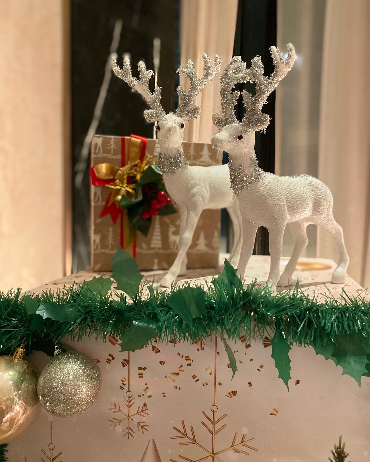 Christmas reindeer and garland display