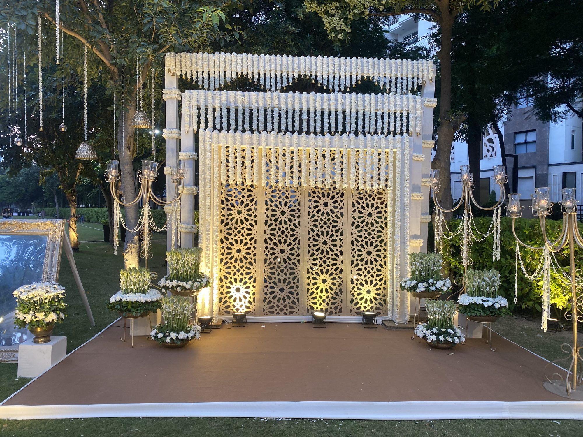 Floral archway walkway at dusk