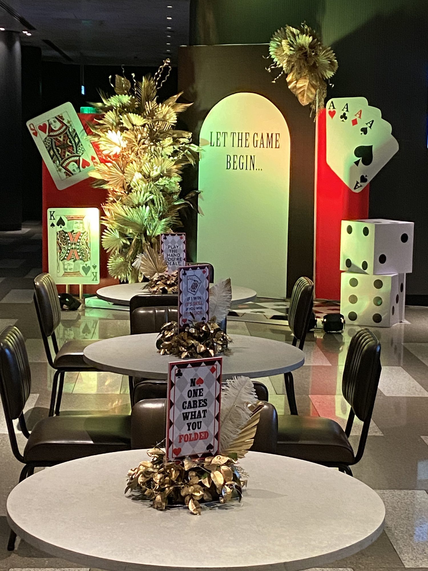 Casino-themed party styling with card and dice decor