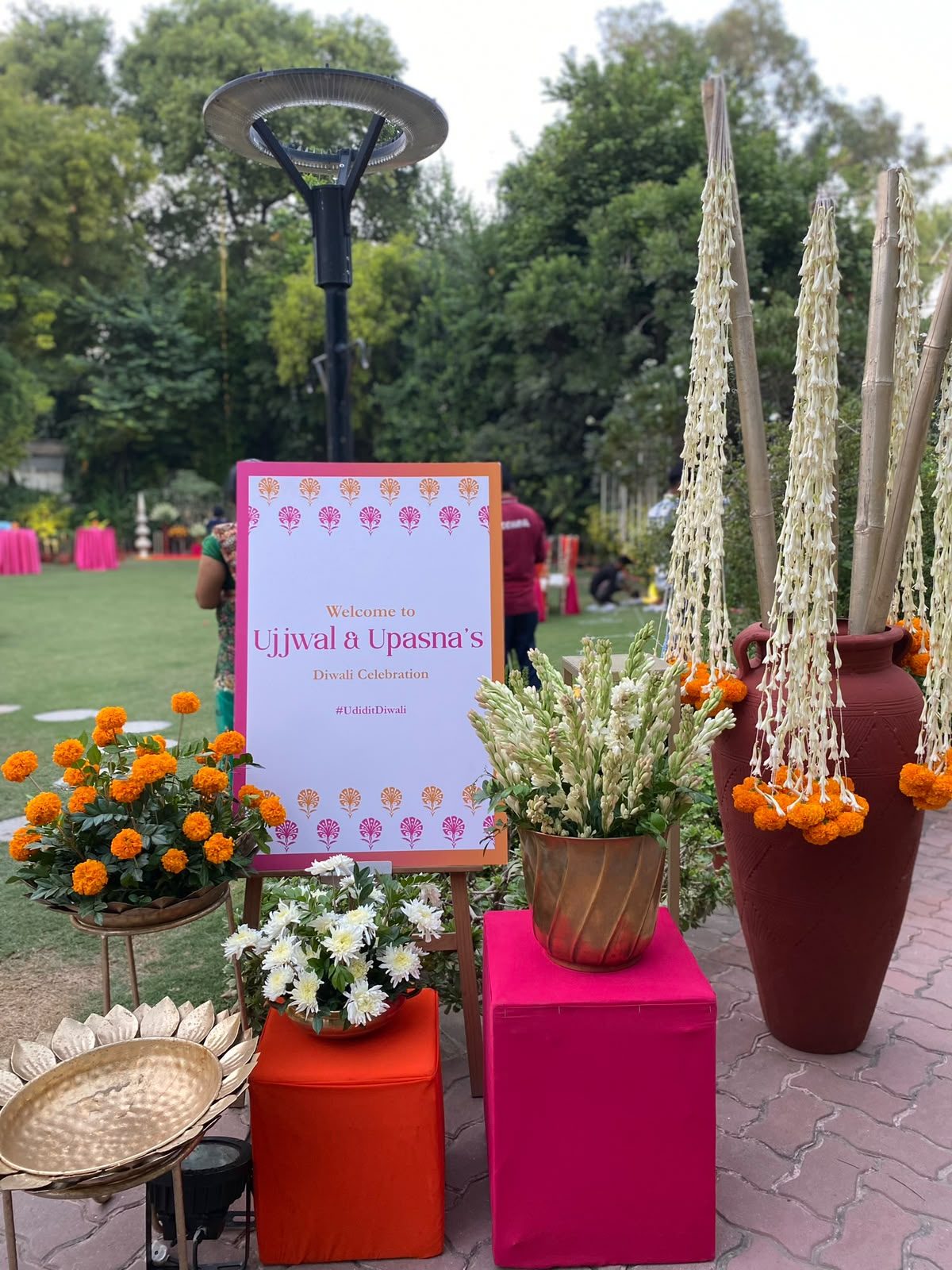 Diwali celebration welcome signage with marigold and jasmine florals