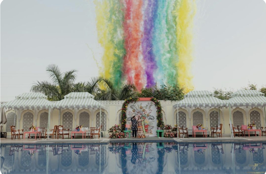 Colourful smoke display over the pool
